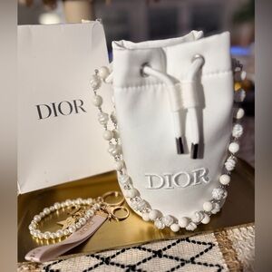🤍SOLD🤍Dior White Drawstring Pouch and Dior Gold Keychain